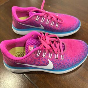 Nike ladies bright pink and blue shoes - size 7